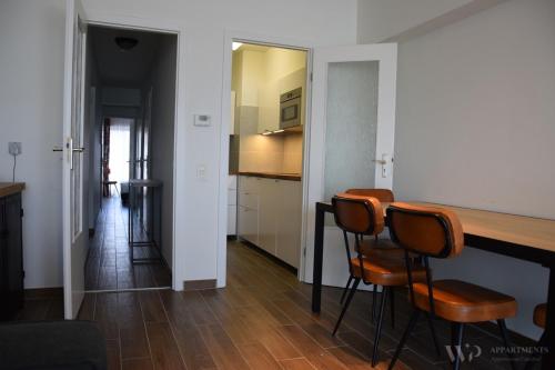 Η κουζίνα ή μικρή κουζίνα στο Residentie Caraibes, 9de verdieping