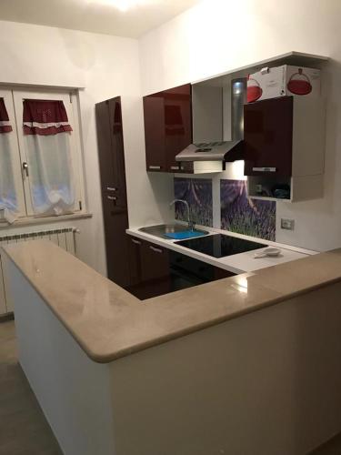 a kitchen with a sink and a counter top at B&B Oleum in Terlizzi