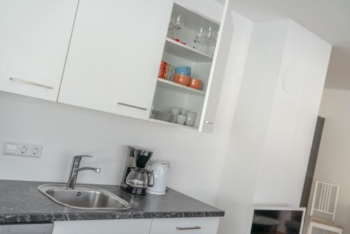 Kuchyňa alebo kuchynka v ubytovaní Appartements Ramsau am Dachstein by Schladmingurlaub