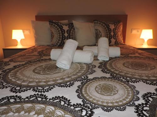A bed or beds in a room at La Manga Apartments - Punta Cormoran