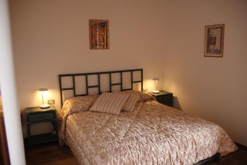 Ліжко або ліжка в номері Casa di Romano, Al Tramonto
