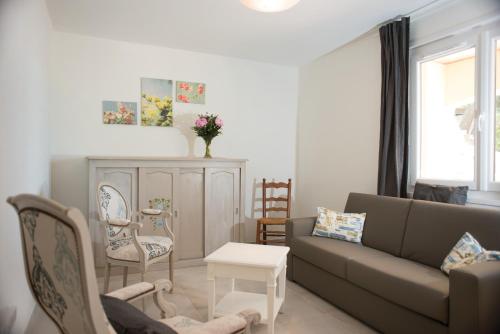 Χώρος καθιστικού στο Appartements des Joncas