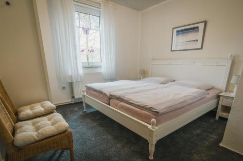 מיטה או מיטות בחדר ב-Boer