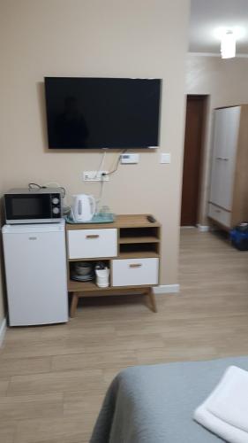 Η κουζίνα ή μικρή κουζίνα στο Apartamenty Białowieża