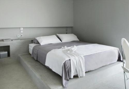 מיטה או מיטות בחדר ב-A la villa grand bleu