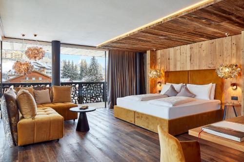 Ένα ή περισσότερα κρεβάτια σε δωμάτιο στο Hotel Christiania