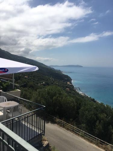 a view of the ocean from a balcony at Residenze Cutrì Casa Vacanze Cilento by ElodeaGroup in Pisciotta