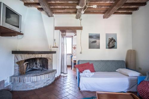 מיטה או מיטות בחדר ב-Agriturismo Goccia di Luna
