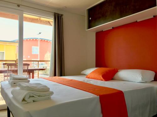 Postel nebo postele na pokoji v ubytování Camping Verona Village