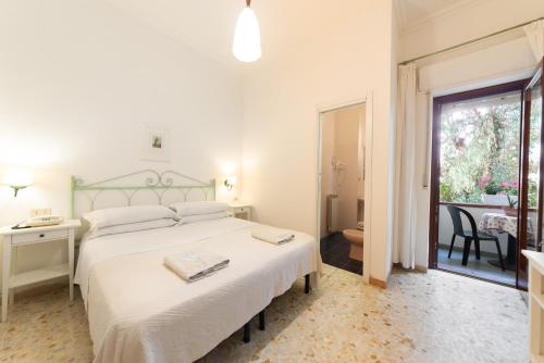 Ένα ή περισσότερα κρεβάτια σε δωμάτιο στο Hotel Europa