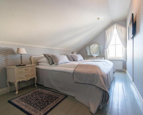 Lillesand Hotel Norgeにあるベッド