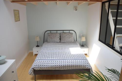 Postel nebo postele na pokoji v ubytování Gîte de la Vallée