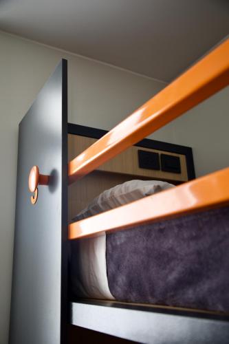 an open door to a bedroom with a bunk bed at America Del Sur Hostel Buenos Aires in Buenos Aires