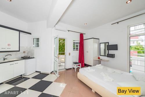 Postel nebo postele na pokoji v ubytování Bay View Apartments