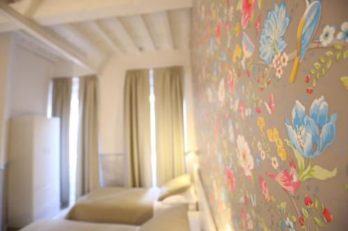 Postel nebo postele na pokoji v ubytování Hotel Bencidormi