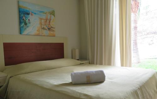 Tropical Gardens Suites and Apartmentsにあるベッド