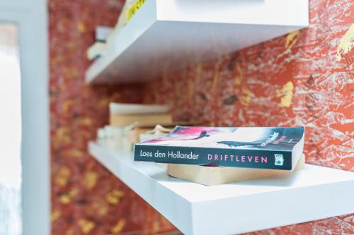 a book sitting on a shelf in a store at Apartments Marina in Zadar