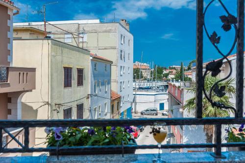 a view of a city from a balcony at Apartments Marina in Zadar