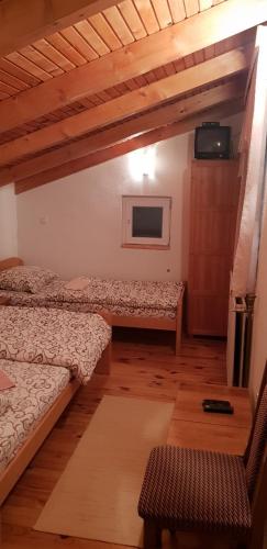 Postel nebo postele na pokoji v ubytování Pansion i Restoran ,, POGLED"