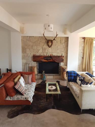 Χώρος καθιστικού στο Albanta casa con costa en Bariloche