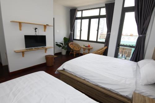 Postel nebo postele na pokoji v ubytování 5 Elements Hotel