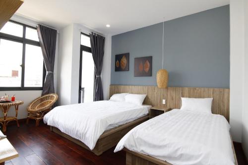 Postel nebo postele na pokoji v ubytování 5 Elements Hotel