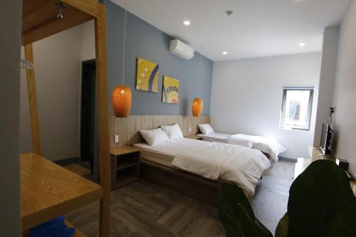 Postel nebo postele na pokoji v ubytování 5 Elements Hotel