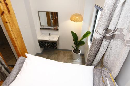 Postel nebo postele na pokoji v ubytování 5 Elements Hotel