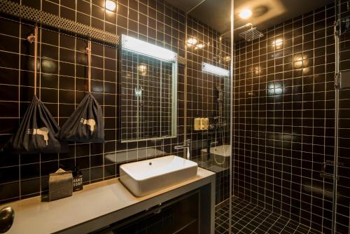 Ein Badezimmer in der Unterkunft Hotel Cappuccino