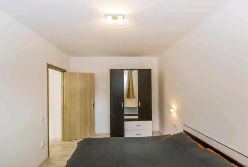 Katil atau katil-katil dalam bilik di Apartament Andra