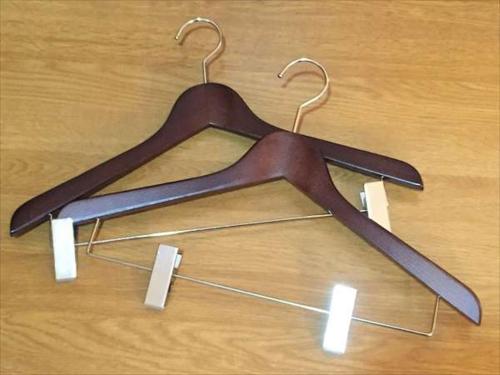 a wooden hanger on a wooden table with lights at GR Hotel Ginzadori in Kumamoto
