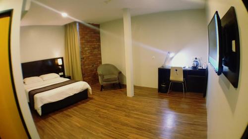 Super 8 Hotel @ Georgetownにあるベッド