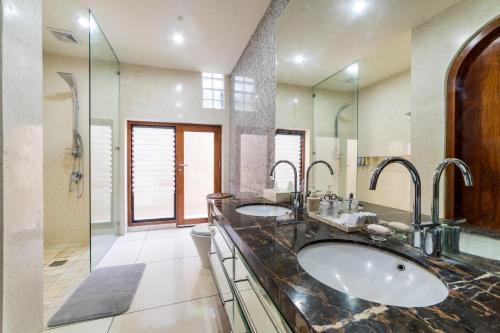 Ванная комната в Villa Costa Plenty