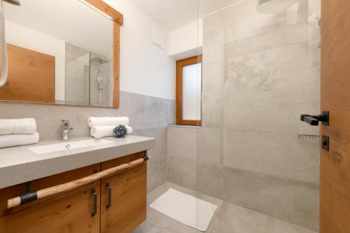 a bathroom with a sink and a shower at Stockhambauer in Kleinarl