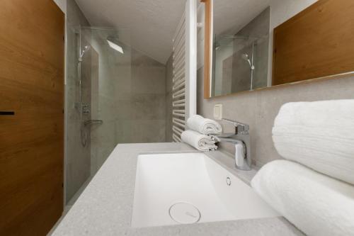 a bathroom with a sink and a shower at Stockhambauer in Kleinarl