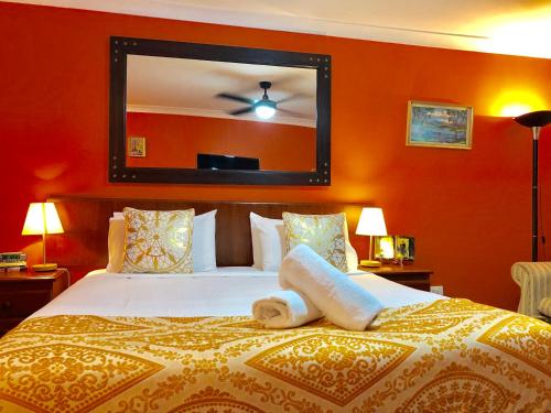 Ένα ή περισσότερα κρεβάτια σε δωμάτιο στο Aussie Rest Motel