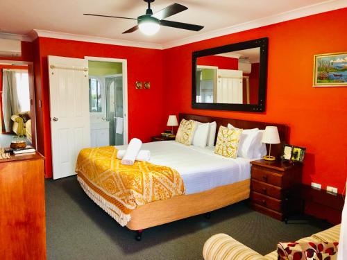 Ένα ή περισσότερα κρεβάτια σε δωμάτιο στο Aussie Rest Motel