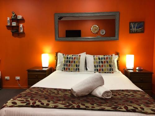 Ένα ή περισσότερα κρεβάτια σε δωμάτιο στο Aussie Rest Motel