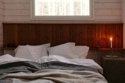 Postel nebo postele na pokoji v ubytování WOODDREAM