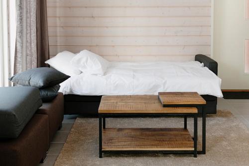 Postel nebo postele na pokoji v ubytování WOODDREAM