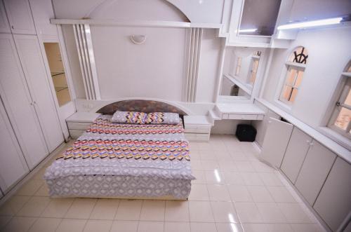 Katil atau katil-katil dalam bilik di Vintage Homestay