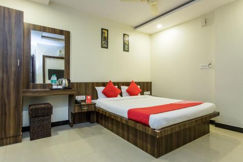 Tempat tidur dalam kamar di Hotel Ashoka Palace