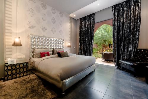 Postel nebo postele na pokoji v ubytování Residence Dar Lamia Marrakech