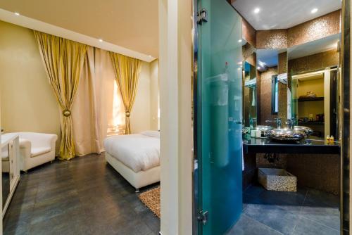 Postel nebo postele na pokoji v ubytování Residence Dar Lamia Marrakech