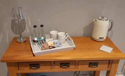a table with a blender on top of it at The Masons Arms in Harrogate