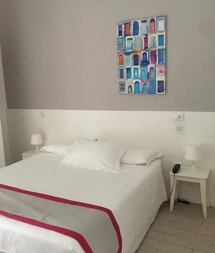 Postel nebo postele na pokoji v ubytování Hotel Spot Varazze