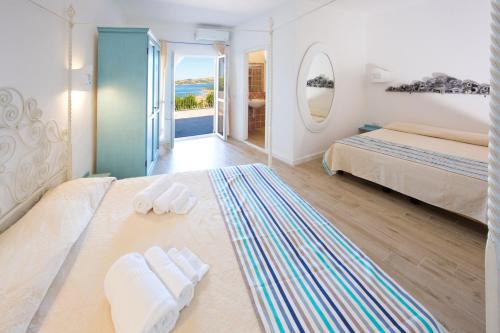 Postel nebo postele na pokoji v ubytování Grand Hotel Palau
