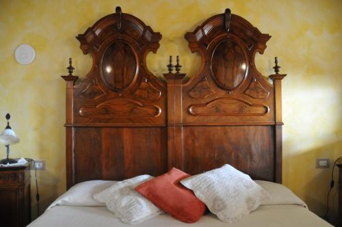 Ένα ή περισσότερα κρεβάτια σε δωμάτιο στο Agriturismo Marco