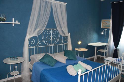 Katil atau katil-katil dalam bilik di Bed and Breakfast al Cucherle