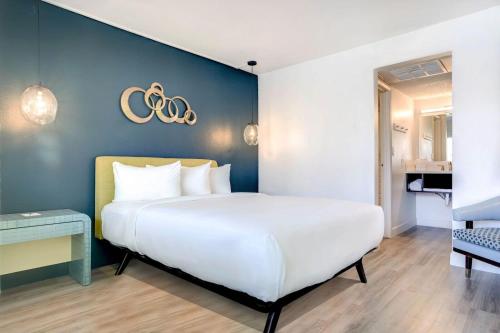 Postel nebo postele na pokoji v ubytování Downtowner Boutique Hotel
